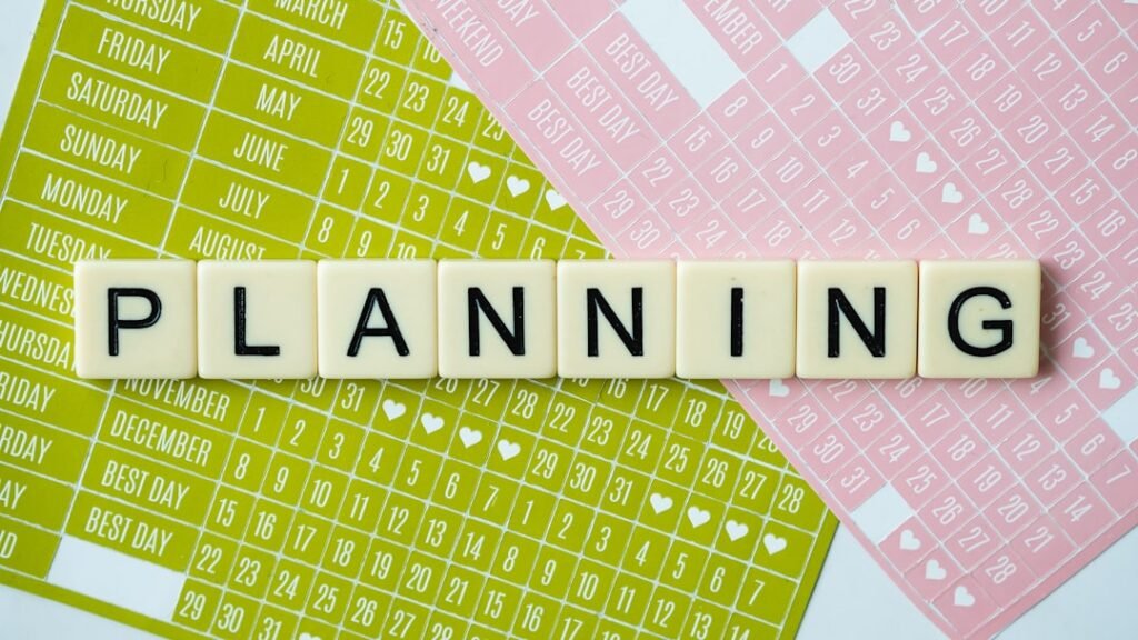 Planning spelled out in letter tiles with calendar background, representing personalized Spanish learning timeline and goal setting