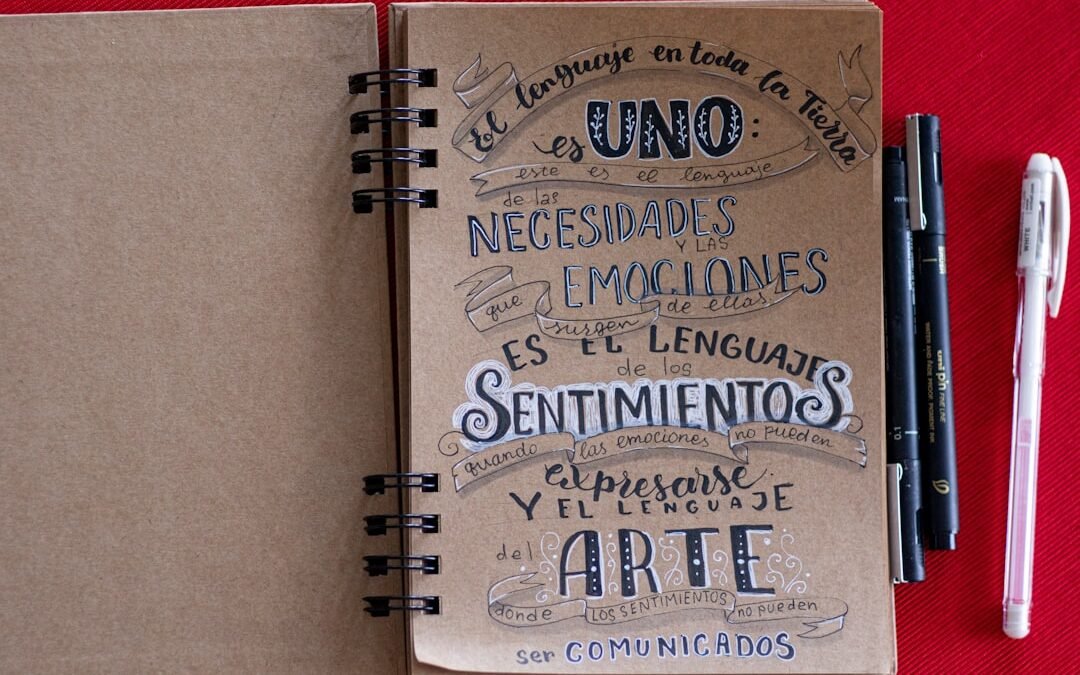Spanish language learning notebook with handwritten vocabulary words and grammar notes. Photo by Carlos Muza